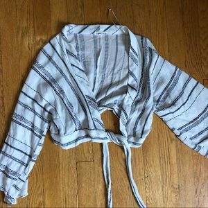 Wide 3/4 sleeve tie front blouse